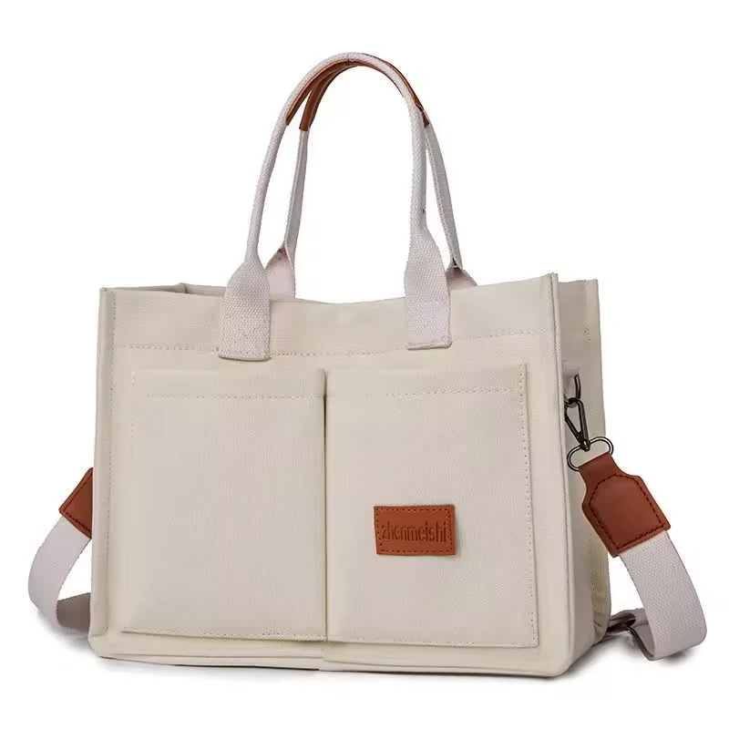 Canvas Tote Bag with Dual Front Pockets and Adjustable Strap product reference image