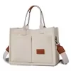 Canvas Tote Bag with Dual Front Pockets and Adjustable Strap Beige color SKU reference
