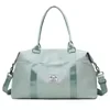 8-Color Travel Duffel with Bottle Pocket and Yoga Mat Strap Green color SKU reference