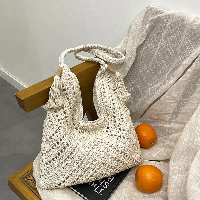 Handwoven Natural Straw Tote with Tassel Trim product reference image