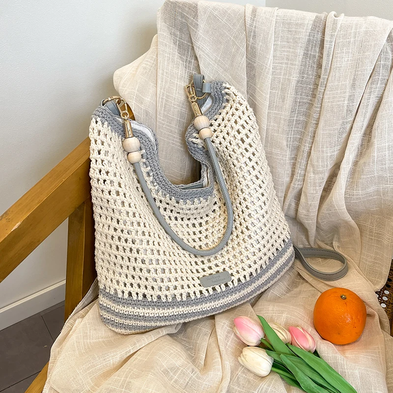 Woven Straw Crossbody Bag with Two Removable Straps product reference image