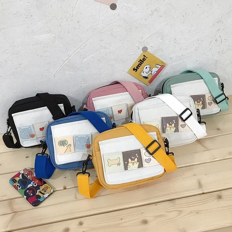 Mini Canvas Crossbody Bag with Two Print Directions product reference image