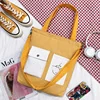 Custom-Printed Canvas Shopping Tote with Front Pocket Yellow · design 1 color SKU reference