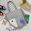 Canvas Student Tote with Rabbit Graphic and Front Pockets Gray color SKU reference