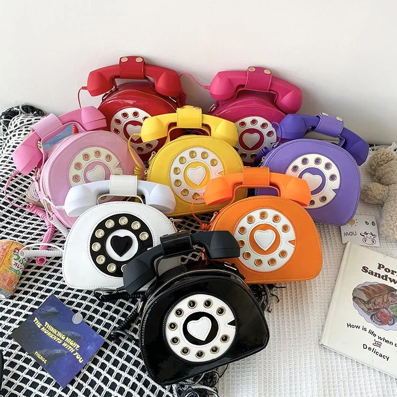 Telephone-Shaped Crossbody Bag with Auxiliary Headphone Detail product reference image