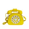 Telephone-Shaped Crossbody Bag with Auxiliary Headphone Detail Melon color SKU reference