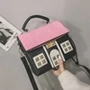 House-Shaped Mini Crossbody Bag with Pink Roof Detail Black color SKU reference