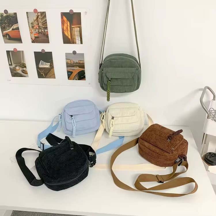Corduroy Crossbody Bag with Adjustable Strap and Decorative Zipper Pull product reference image