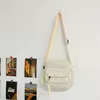 Corduroy Crossbody Bag with Adjustable Strap and Decorative Zipper Pull Cream White color SKU reference