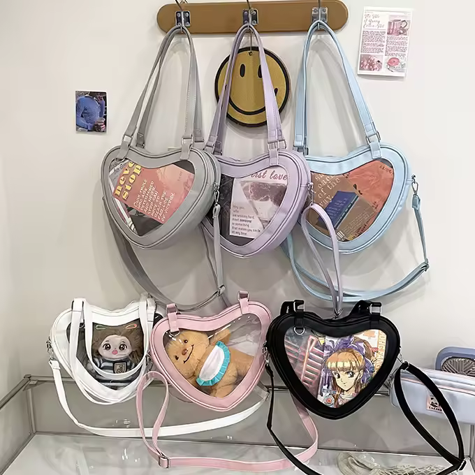 Heart-Shaped PU Crossbody Bag with Clear Front Panel product reference image