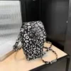 Phone-Style PU Crossbody Bag with Leopard Print & Lion-Head Accent Black color SKU reference