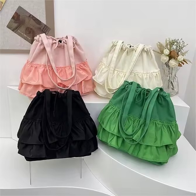 Embroidered Canvas Tote with Tulle Pleats and Drawstring Closure product reference image