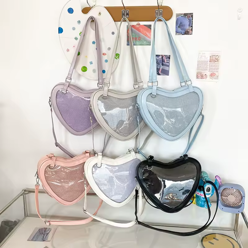 Heart-Shaped PU Crossbody Bag with Adjustable Strap product reference image