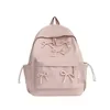 Nylon Student Backpack with Bow Details and Back Zip Pocket Pink color SKU reference
