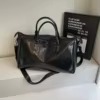 PU Gym Duffel with Detachable Strap and Rivet Base Black color SKU reference