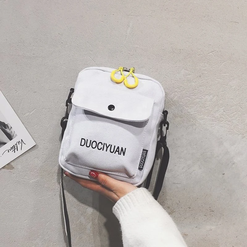 Canvas Mini Crossbody Bag with Earphone Access product reference image