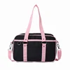 Canvas Mini Crossbody Purse with Twin Handles and Shoulder Strap Pink color SKU reference