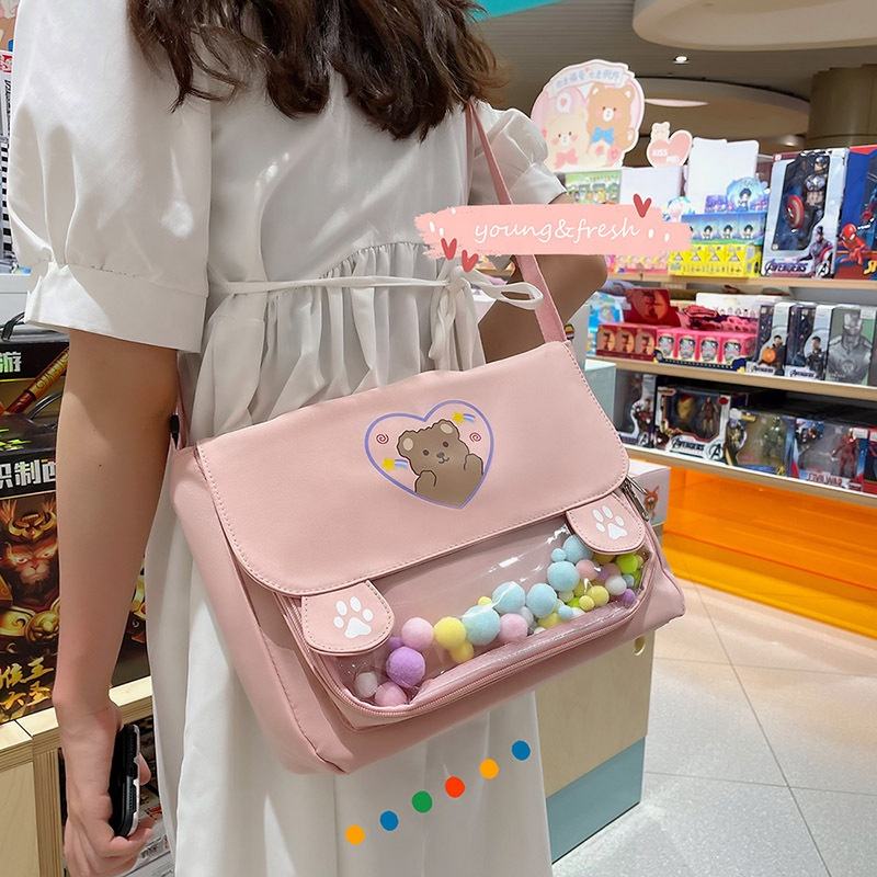 Bear-Print Mini Shoulder Bag with Pom-Pom Charm product reference image