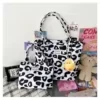 Cow-Print Canvas Tote Bag in Two Sizes Pink cow print · larger size color SKU reference