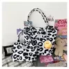 Cow-Print Canvas Tote Bag in Two Sizes Pink cow print · compact size color SKU reference
