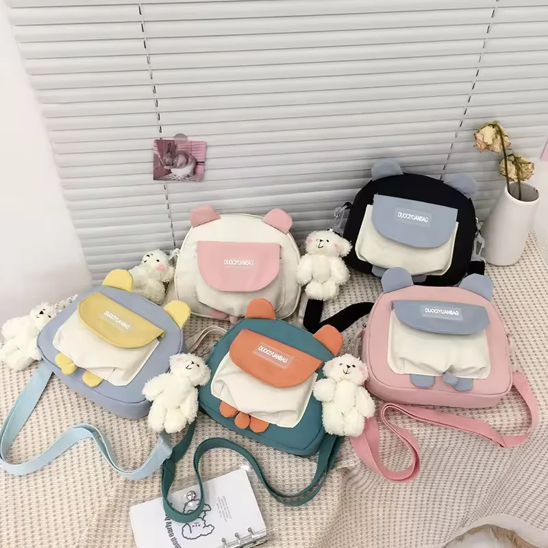 Animal-Detail Nylon Mini Crossbody Bag with Plush Accent product reference image
