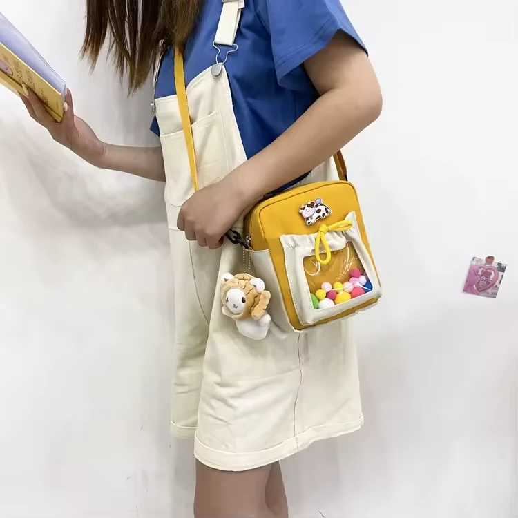 Canvas Mini Crossbody Bag with Clear PVC Front Pocket product reference image