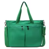 Canvas Laptop Tote with Front Pocket and Metal Buckle Green color SKU reference
