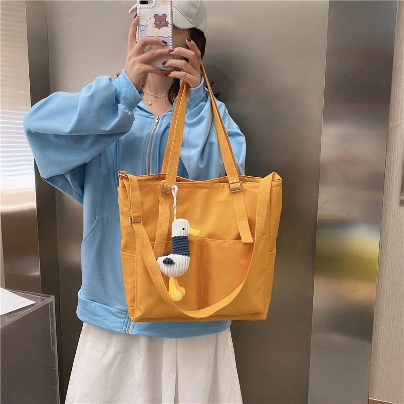 Canvas Everyday Tote with Chain and Charm Detail product reference image