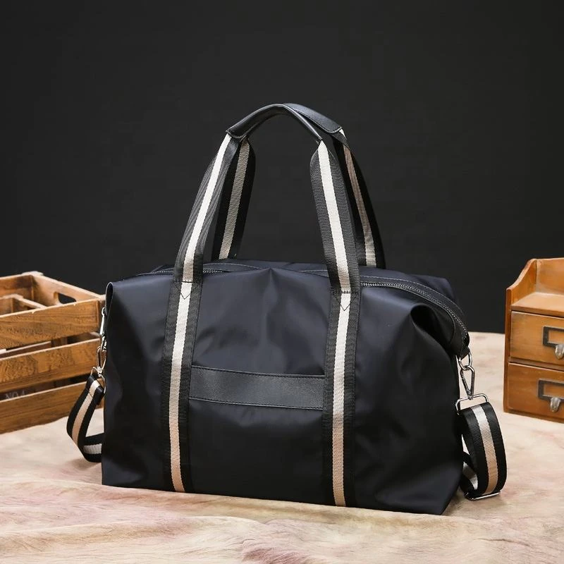Two-Size Travel Duffel with Patterned Strap Accent product reference image