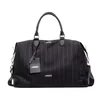 Striped Canvas Travel Duffel with Adjustable Strap Black stripe color SKU reference