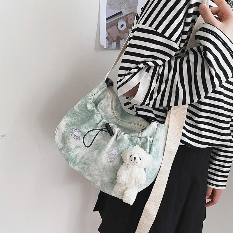 Patterned Drawstring Shoulder Bag with Bunny Charm Green color SKU reference