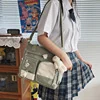 Mini Nylon Crossbody Bag with Letter and Cartoon Details Green color SKU reference