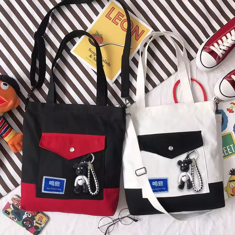 Cotton Crossbody Tote with Front Pocket and Bear Pendant product reference image