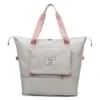 Expandable Nylon Travel Tote with Trolley Sleeve Off White with Pink Trim color SKU reference