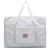 Checkerboard Jacquard Oversize Travel Duffel in Two Sizes White color SKU reference