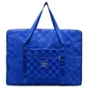 Checkerboard Jacquard Oversize Travel Duffel in Two Sizes Dark blue color SKU reference