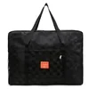 Checkerboard Jacquard Oversize Travel Duffel in Two Sizes Black color SKU reference