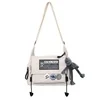 Canvas Letter-Print Messenger Bag with Plush Pendant White color SKU reference