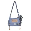 Canvas Letter-Print Messenger Bag with Plush Pendant Blue color SKU reference