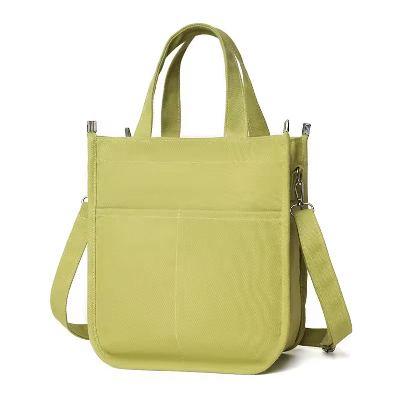 Compact Canvas Handbag with Removable Shoulder Strap product reference image