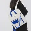 Klein-Blue Backpack with Acrylic Chain and Front Zip Pocket White color SKU reference