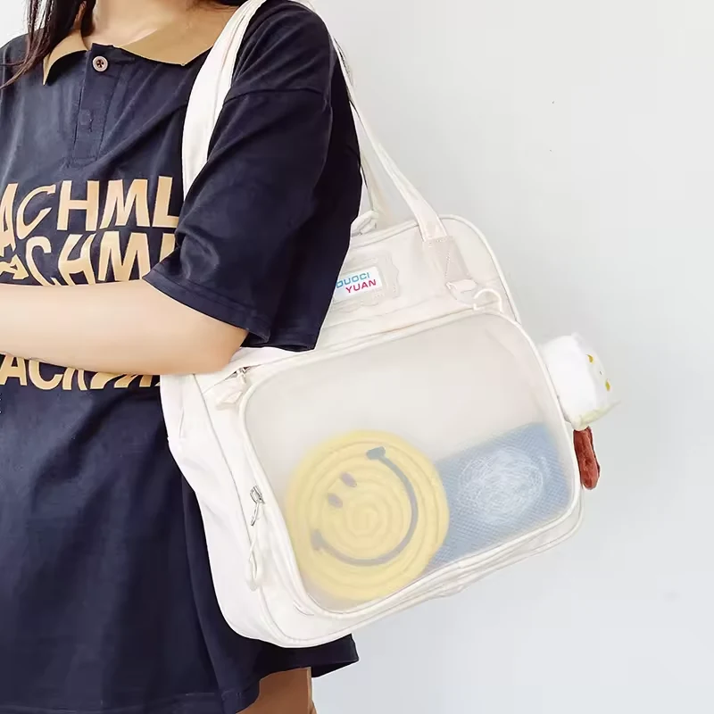 Clear-Front Pocket Tote with Plush Pendant product reference image