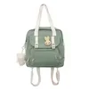 Nylon School Crossbody Bag with Rabbit Badge and Lamb Charm Green color SKU reference