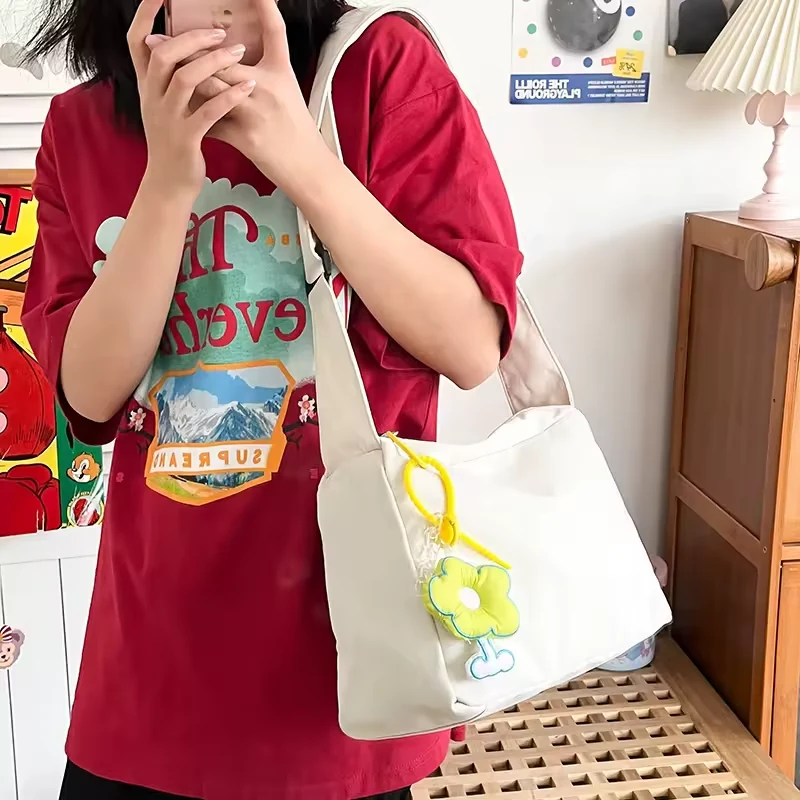 Canvas Messenger Tote with Flower Charm product reference image