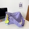 Canvas Messenger Tote with Flower Charm Purple color SKU reference
