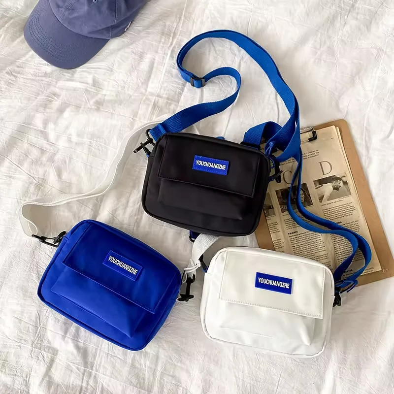 Small Nylon Messenger Bag with Adjustable Strap product reference image