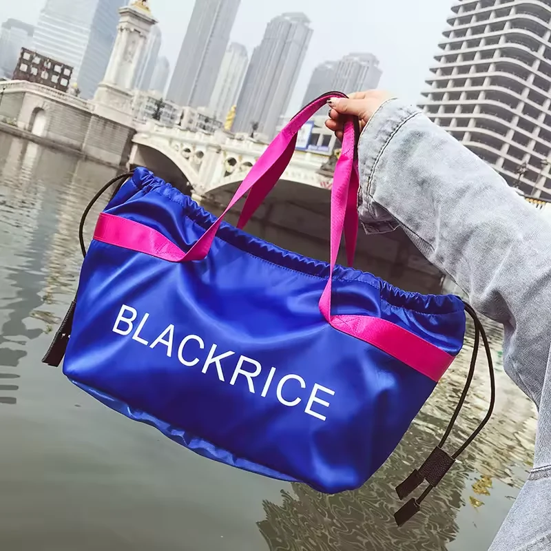 Nylon Color-Block Drawstring Travel Duffel with Soft Handles product reference image