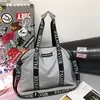 Nylon Gym Tote with Shoe Pocket and Reflective Detail Orange color SKU reference