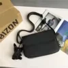 Oxford Crossbody Bag with Plush Charm Black color SKU reference