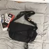 Oxford Utility Crossbody Bag with Detachable Charm Black color SKU reference